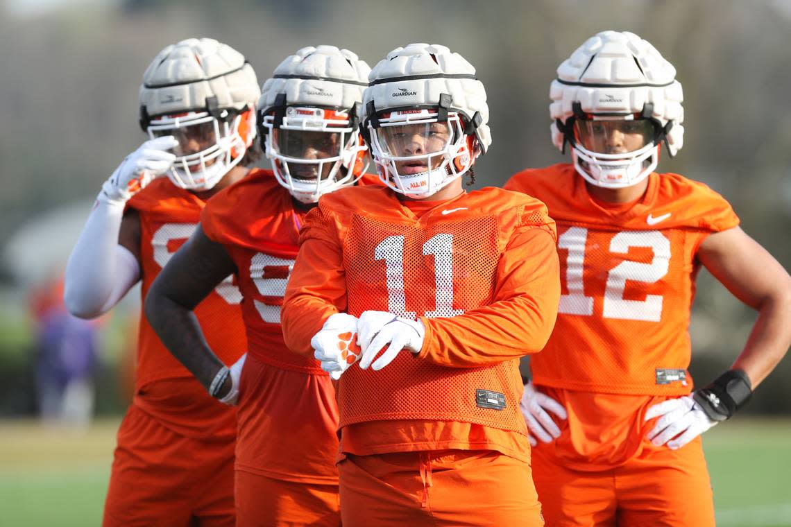 Clemson football defensive linemen Peter Woods (11) and T.J. Parker (12) during the Tigers’ opening day of spring practice at the Allen N. Reeves Football Complex on March 6, 2023.