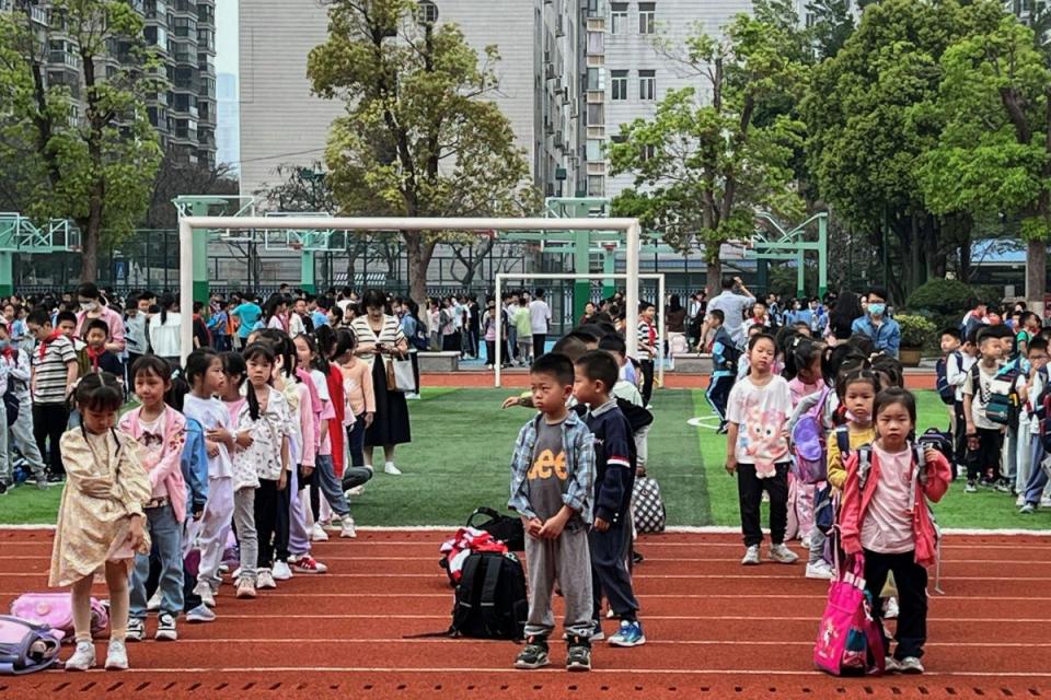 Students evacuate to the playground at a school in Xiamen, in eastern China’s Fujian province on April 3, 2024, after a major earthquake hit Taiwan’s east.<span class="copyright">AFP/Getty Images</span>