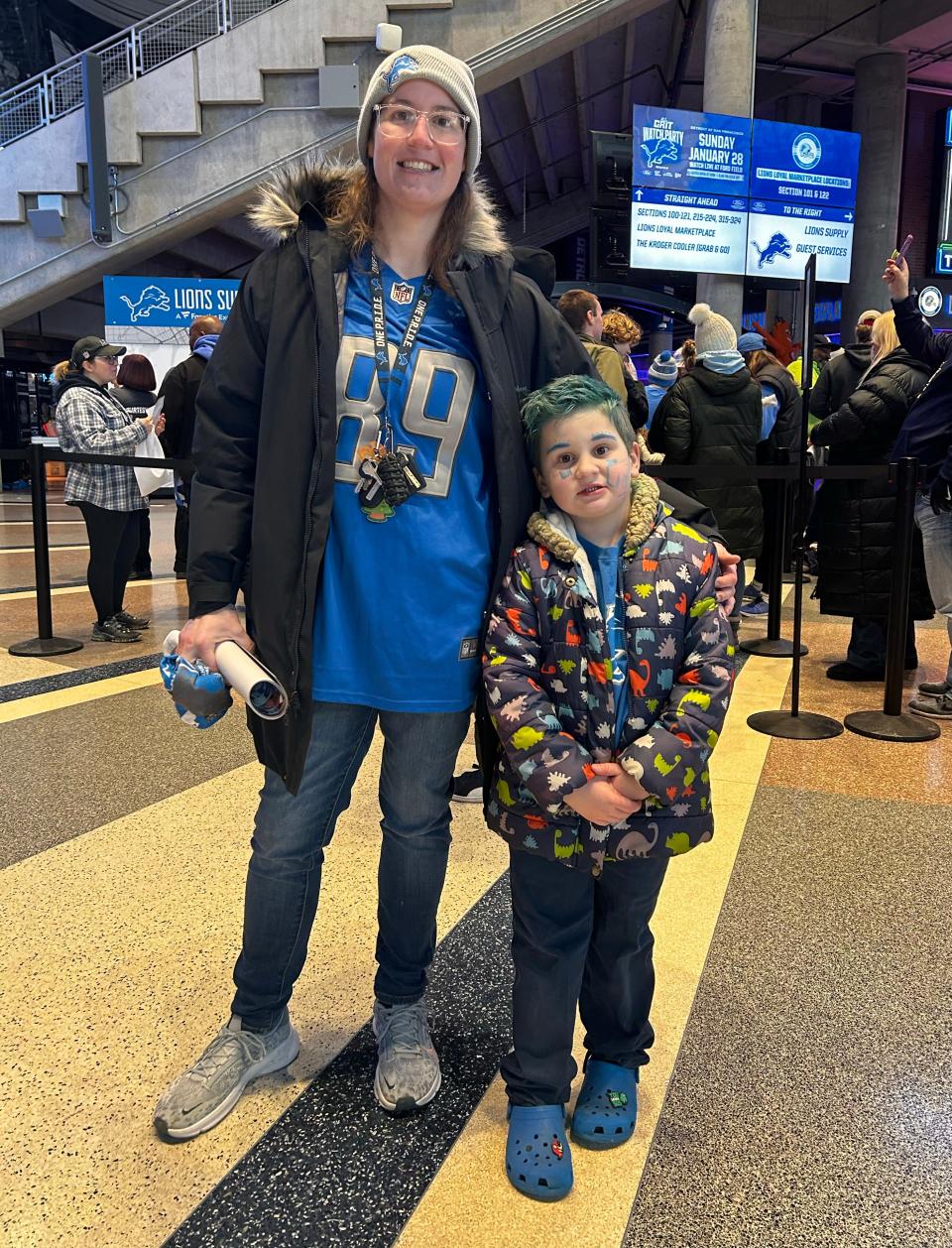 Stephanie Zalba and her son, William, attend the Lions watch party at Ford Field on Sunday, Jan. 28, 2024.