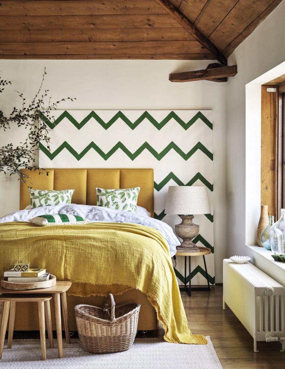 bedroom with patterned wall art