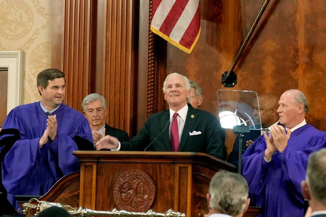 Gov. Henry McMaster smiles and looks to the balcony after introducing his wife, first lady Peggy McMaster, at the beginning of his State of the State address on Wednesday, Jan. 25, 2023, in Columbia, S.C. (AP Photo/Meg Kinnard)