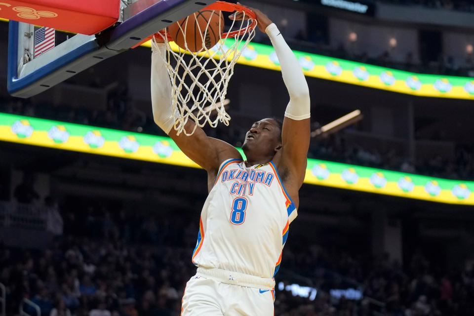 Oklahoma City forward Jalen Williams (8) dunks against Golden State during the first half Saturday in San Francisco.