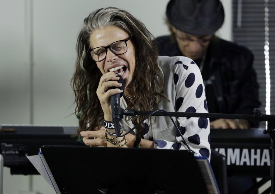 FORT LAUDERDALE, FL - NOVEMBER 10:  (EXCLUSIVE COVERAGE) Steven Tyler performs and speaks with clients of Recovery Unplugged Treatment Center to provide the powerful, inspirational message of recovery through music with longtime friend, singer/songwriter, Richie Supa on November 10, 2014 in Fort Lauderdale, Florida.  (Photo by Alexander Tamargo/Getty Images for Recovery Unplugged)