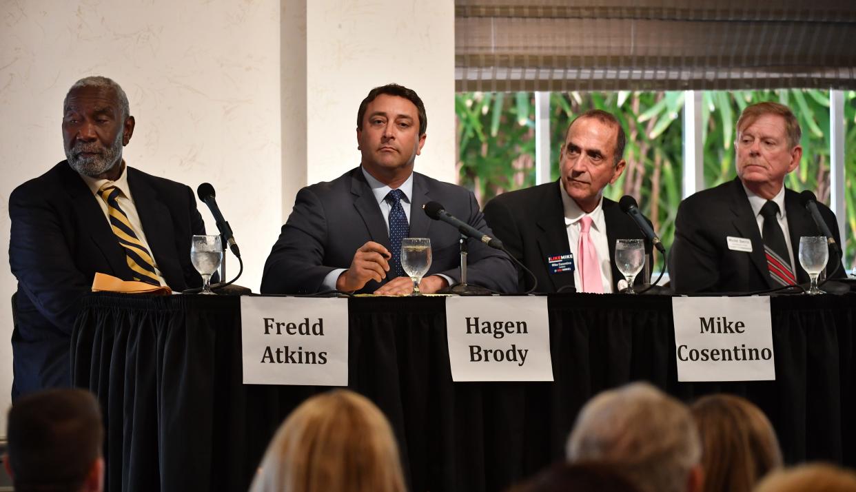 Candidates for Sarasota County Commission District 2, from left, Fredd Atkins, Hagen Brody, Mike Cosentino and Mark Smith, at a Tiger Bay Club candidate forum on July 7. Atkins, Brody and Cosentino are competing in the Democratic primary, while Smith is competing against Lourdes Ramirez in the Republican primary.