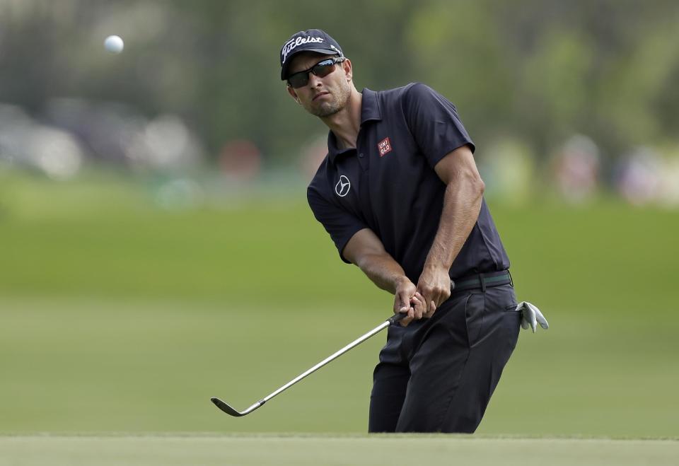 Adam Scott, of Australia, chips onto the fifth green during the final round of the Arnold Palmer Invitational golf tournament at Bay Hill, Sunday, March 23, 2014, in Orlando, Fla. (AP Photo/Chris O'Meara)