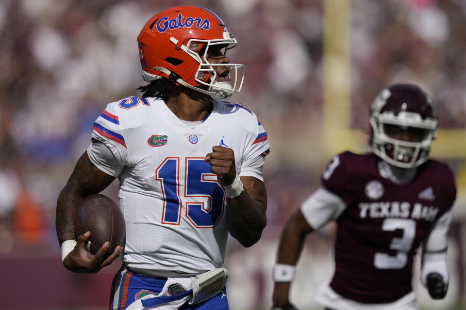 Florida quarterback Anthony Richardson (15) outruns the Texas A&M defense for a 60-yard touchdown run during the first quarter of an NCAA college football game Saturday, Nov. 5, 2022, in College Station, Texas. (AP Photo/Sam Craft)