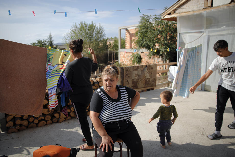 Azime Ali Topchu, 48, a Bulgarian Roma woman, pauses during an interview with the Associated Press in a village on the outskirts of Burgas, Bulgaria, Monday, Sept. 28, 2020.(AP Photo/Vadim Ghirda)