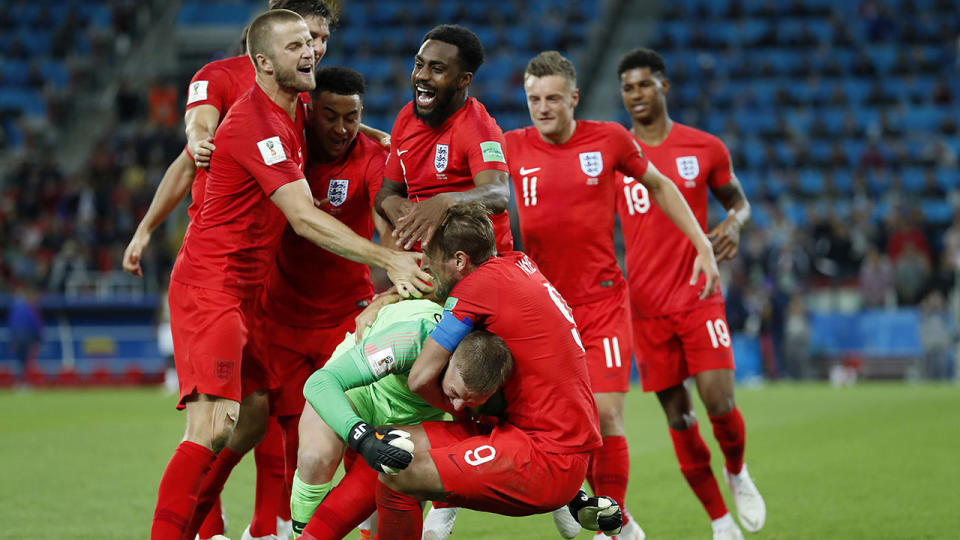 England players celebrate the country’s first win in a World Cup penalty shootout. Pic: Getty