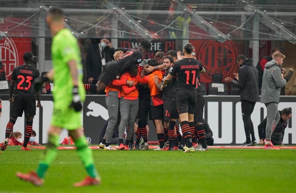 AC Milan players celebrate Koray Gunter’s own goal (Antonio Calanni/AP) (AP)