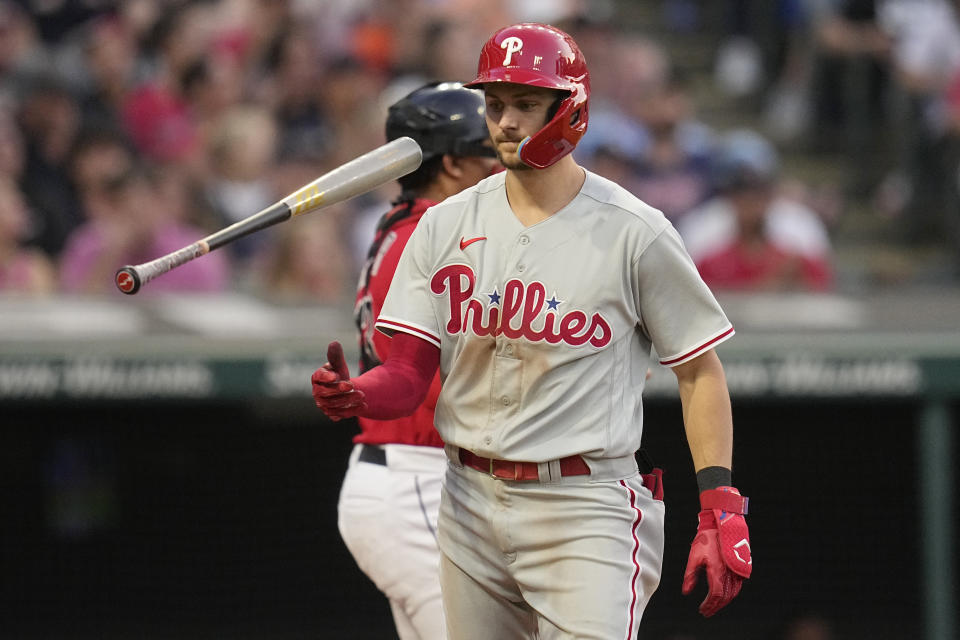 Philadelphia Phillies' Trea Turner flips his bat as he walks back to the dugout after striking out in the sixth inning of a baseball game against the Cleveland Guardians, Saturday, July 22, 2023, in Cleveland. (AP Photo/Sue Ogrocki)