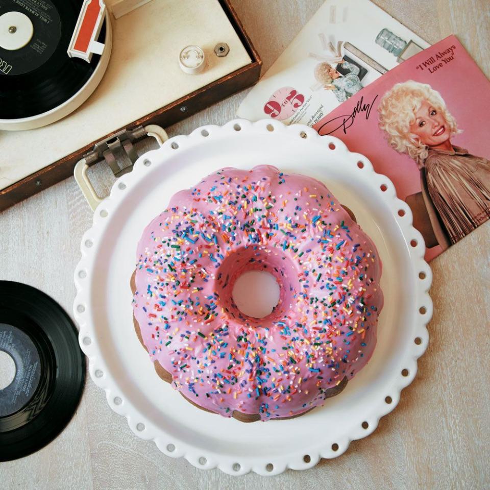 <p>If your mom loves Dolly as much as we do, perhaps she'd appreciate this homage to the Queen of Country, from Brooklyn's <a href="https://bakednyc.com/" rel="nofollow noopener" target="_blank" data-ylk="slk:Baked;elm:context_link;itc:0;sec:content-canvas" class="link ">Baked</a>. It's a giant donut-like glazed cake packed with <a href="https://www.countryliving.com/food-drinks/a34223656/dark-chocolate-coconut-filling/" rel="nofollow noopener" target="_blank" data-ylk="slk:dark chocolate coconut filling;elm:context_link;itc:0;sec:content-canvas" class="link ">dark chocolate coconut filling</a> and covered in a <a href="https://www.countryliving.com/food-drinks/a34223745/simple-coconut-glaze/" rel="nofollow noopener" target="_blank" data-ylk="slk:simple coconut glaze;elm:context_link;itc:0;sec:content-canvas" class="link ">simple coconut glaze</a>.</p><p><strong><a href="https://www.countryliving.com/food-drinks/a34222825/dollys-donut-coconut-bundt-cake/" rel="nofollow noopener" target="_blank" data-ylk="slk:Get the recipe for Dolly's Donut Coconut Bundt Cake;elm:context_link;itc:0;sec:content-canvas" class="link ">Get the recipe for Dolly's Donut Coconut Bundt Cake</a>. </strong> </p>