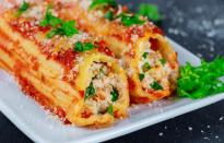 <p>Manicotti, the <a href="https://www.thedailymeal.com/healthy-eating/make-your-meals-easier-guide-meal-prepping-slideshow?referrer=yahoo&category=beauty_food&include_utm=1&utm_medium=referral&utm_source=yahoo&utm_campaign=feed" rel="nofollow noopener" target="_blank" data-ylk="slk:quintessential make-ahead meal;elm:context_link;itc:0;sec:content-canvas" class="link ">quintessential make-ahead meal</a>, is perfect for holidays, potlucks and everything in between. Sort of like an Italian enchilada, manicotti shells are stuffed with a homemade cheese-and-spinach filling and topped with sauce. Toss it into the oven the day of your event and it’ll be fresh and piping hot when you need it.</p> <p><a href="https://www.thedailymeal.com/recipes/cheese-spinach-manicotti?referrer=yahoo&category=beauty_food&include_utm=1&utm_medium=referral&utm_source=yahoo&utm_campaign=feed" rel="nofollow noopener" target="_blank" data-ylk="slk:For the Cheese and Spinach Manicotti recipe, click here.;elm:context_link;itc:0;sec:content-canvas" class="link ">For the Cheese and Spinach Manicotti recipe, click here.</a></p>