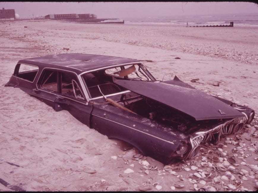 All kinds of trash used to be dumped outside New York City, like this car at Breezy Point, south of Jamaica Bay. The EPA helped institute regulations for how the city disposed of trash to prevent dumping in the Atlantic.