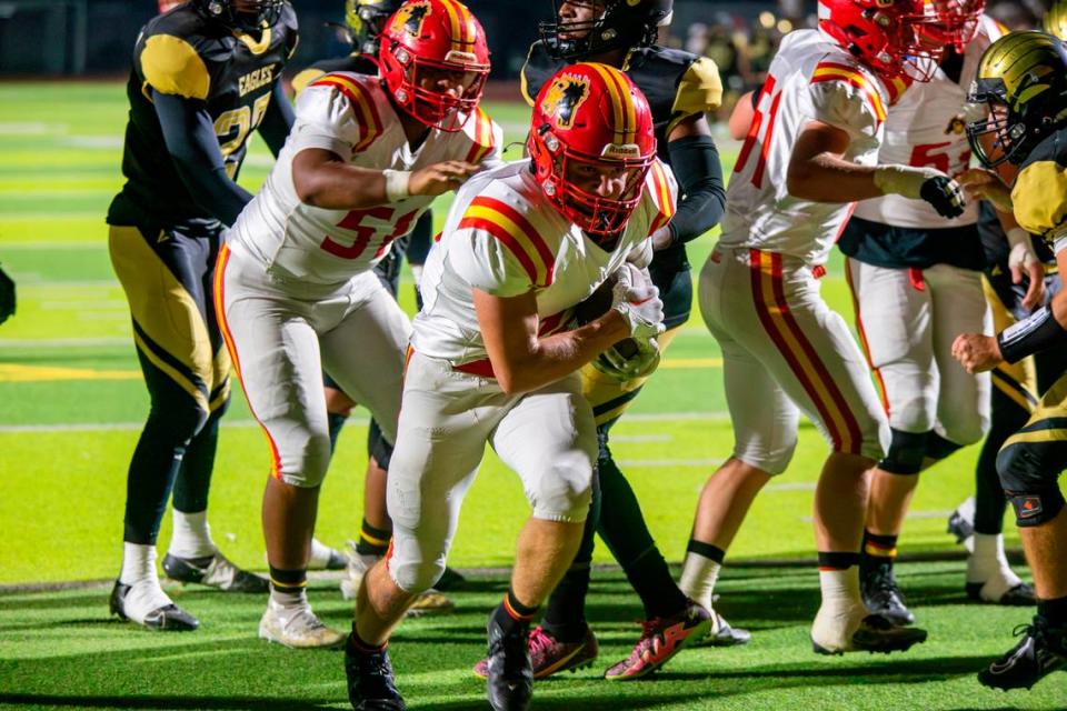 Wes Burford, 12, of Oakdale High works his way into the end zone for a touchdown. During the Oakdale vs Enochs game Friday Sept. 22, 2023.