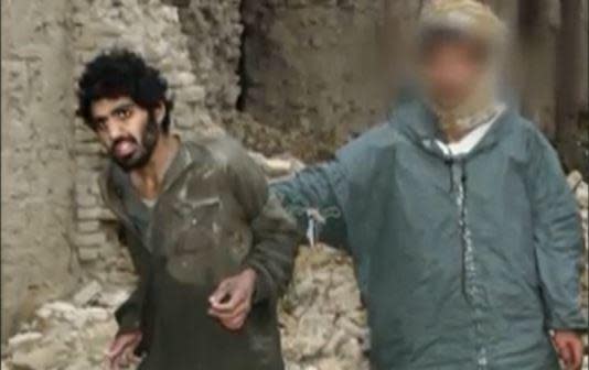 Saudi Arabian national Yaser Esam Hamdi is seen after being captured in Afghanistan in the wake of the U.S.-led invasion in 2011.  