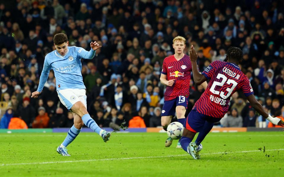 Manchester City's Julian Alvarez scores their third goal