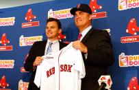 BOSTON, MA - OCTOBER 23: Executive Vice President and General Manager of the Boston Red Sox, Ben Cherington (L), introduces John Farrell as the new manager, the 46th manager in the club's 112-year history, on October 23, 2012 at Fenway Park in Boston, Massachusetts. (Photo by Jared Wickerham/Getty Images)