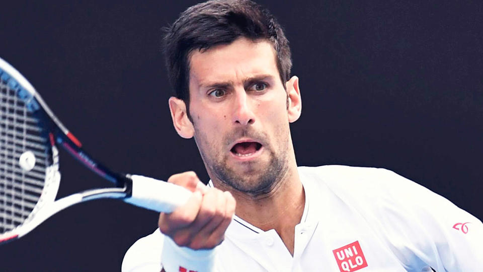 Pictured here, Novak Djokovic hits a forehand shot during a tennis match.