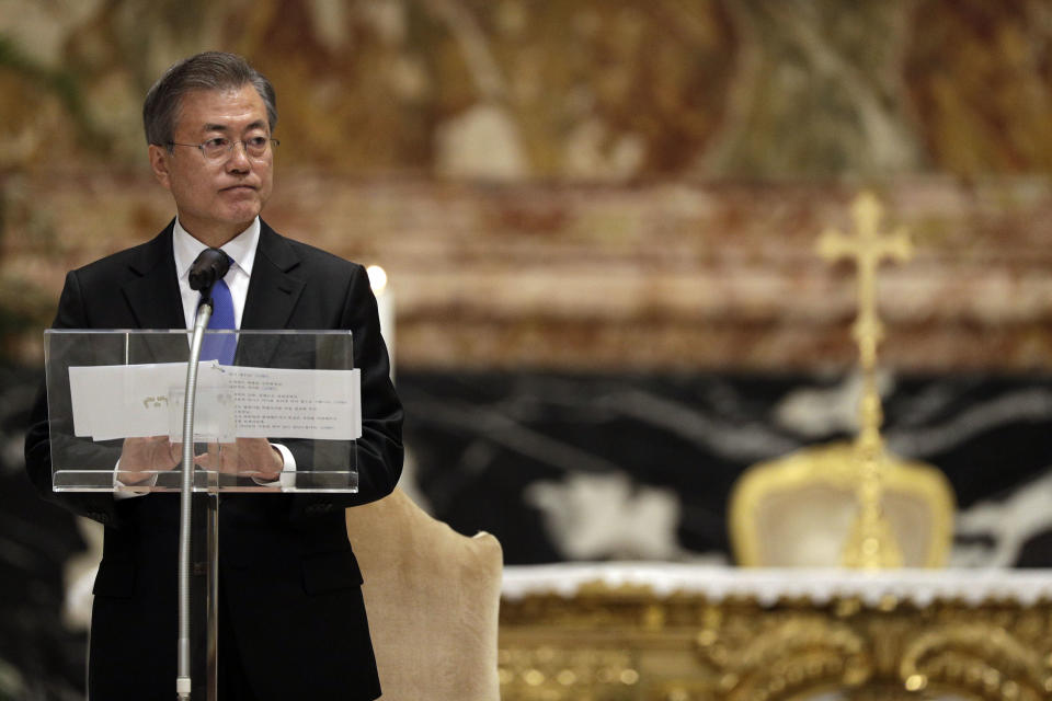 South Korean President Moon Jae-in delivers a speech at the end of a Mass for peace inside St. Peter's Basilica at the Vatican, Wednesday, Oct. 17, 2018. South Korea's president is in Italy for a series of meetings that will culminate with an audience with Pope Francis at which he's expected to extend an invitation from North Korean leader Kim Jong Un to visit. (AP Photo/Gregorio Borgia)