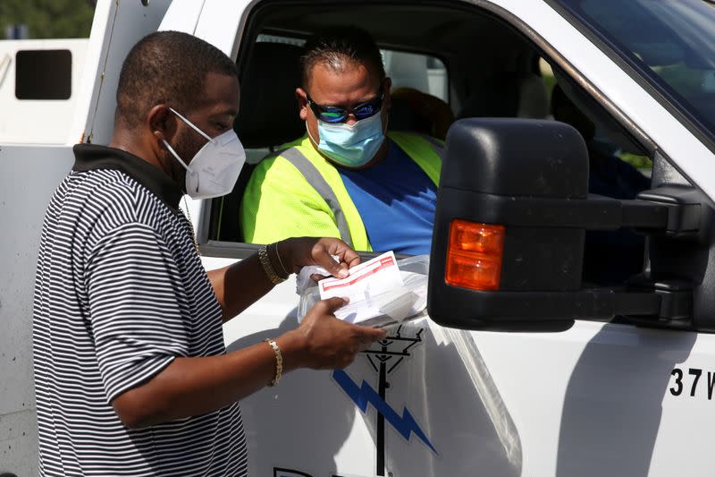 FILE PHOTO: Voters cast their ballots in Florida's primaries