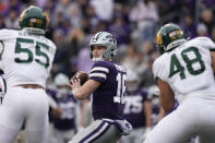 Kansas State quarterback Will Howard (18) looks to pass during the second half of an NCAA college football game against Baylor Saturday, Nov. 11, 2023, in Manhattan, Kan. (AP Photo/Charlie Riedel)