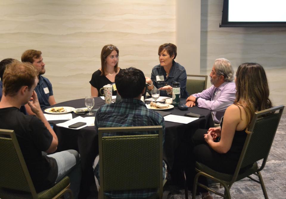 Fort Collins City Council member Shirley Peel speaks to students while seated alongside Larimer County Commissioner John Kefalas at the ASCSU Community Roundtable on Monday in the Never No Summer Room at Colorado State University's Lory Student Center in Fort Collins.