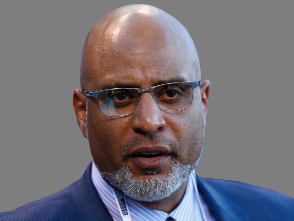 Tony Clark headshot, as Major League Baseball Players Association executive director, graphic element on gray