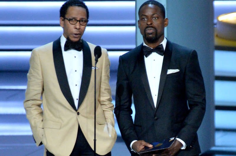 Ron Cephas Jones (L) and Sterling K. Brown speak onstage during the 70th annual Primetime Emmy Awards at the Microsoft Theater in downtown Los Angeles in 2018. File Photo by Jim Ruymen/UPI