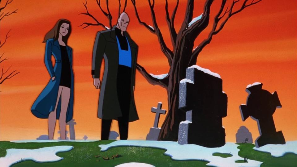 Mr. Freeze stands at the cemetery with a companion