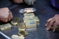 Gold bars are seen before the refining process at AGR (African Gold Refinery) in Entebbe