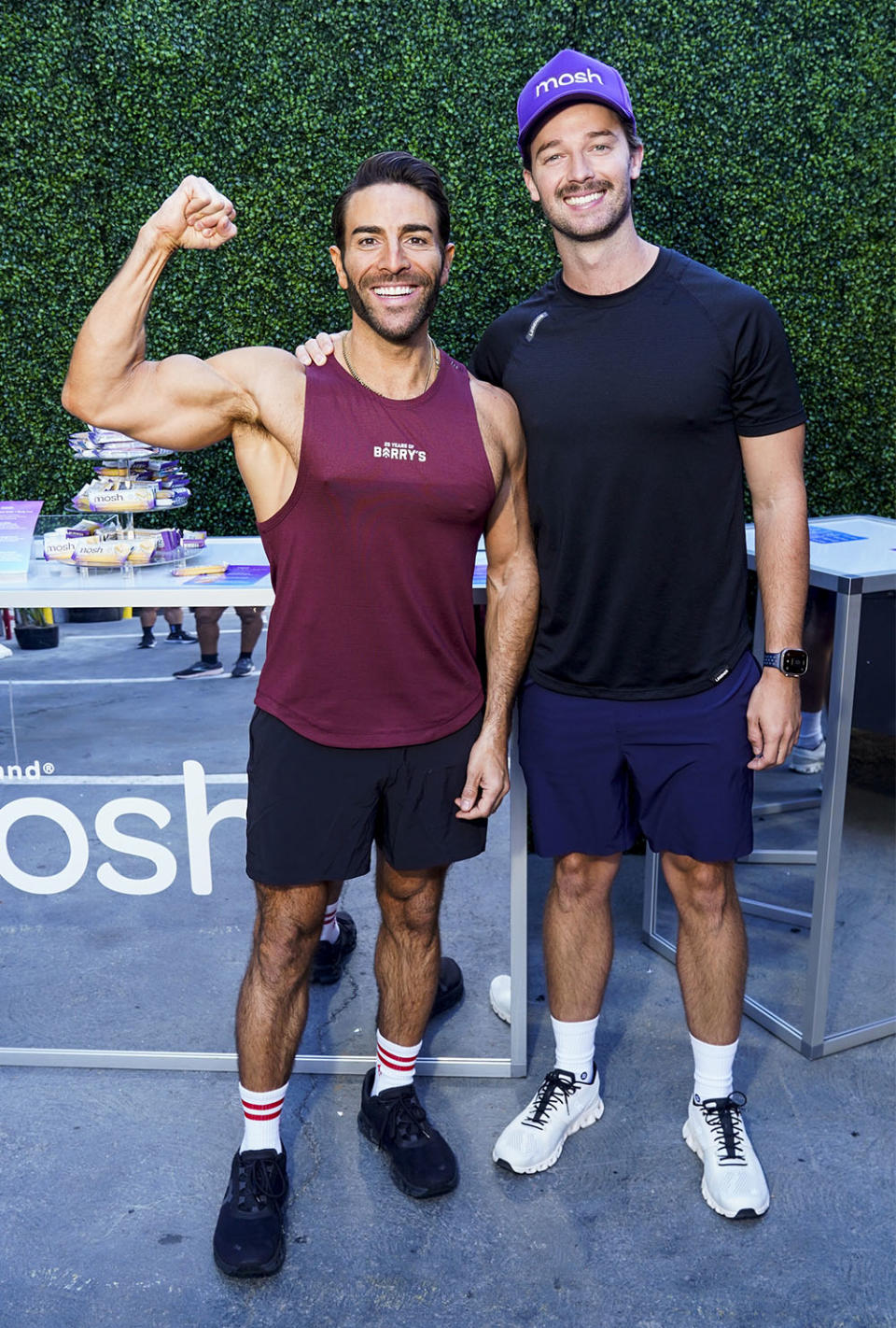 Joey Gonzalez and Patrick Schwarzenegger attend Barry's 25th Anniversary Mega-Class at Red Studios on October 07, 2023 in Los Angeles, California.