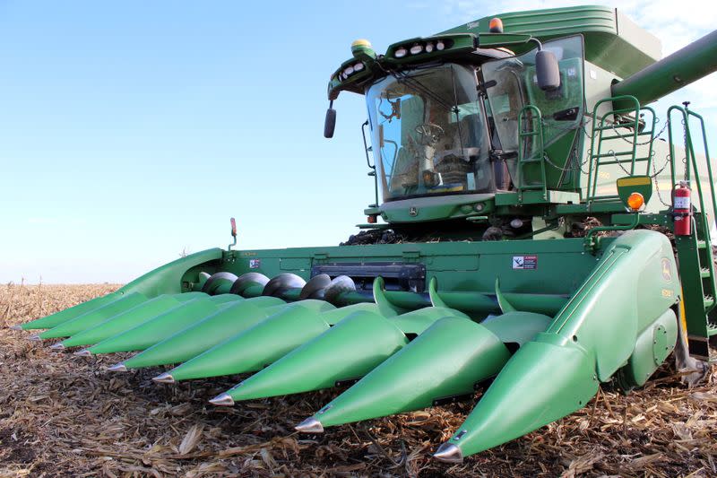 FILE PHOTO: A farmer's corn harvesting combine is seen during the corn harvest in Eldon, Iowa