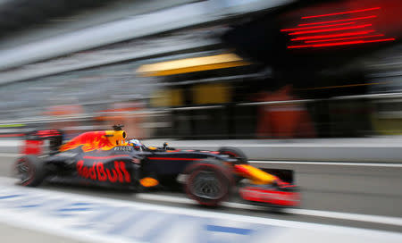 Formula One - Russian Grand Prix - Sochi, Russia - 30/4/16 - Red Bull F1 driver Daniel Ricciardo of Australia drives along the pitlane during the third practice session. REUTERS/Maxim Shemetov