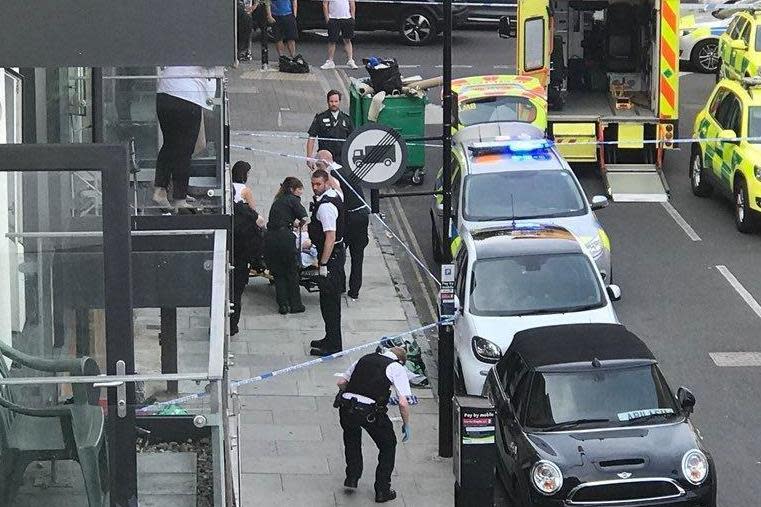 Police on the scene of a stabbing in Archway where a 14-year-old boy was attacked