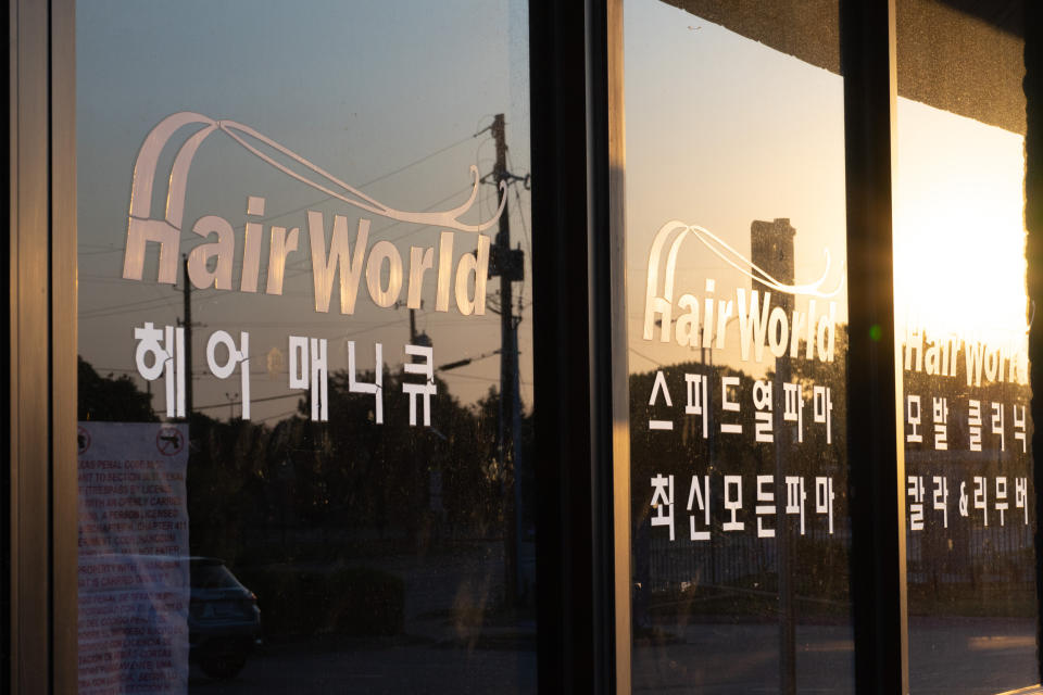 Hair World Salon remained closed on Sunday. (Raul Rodriguez for NBC News)