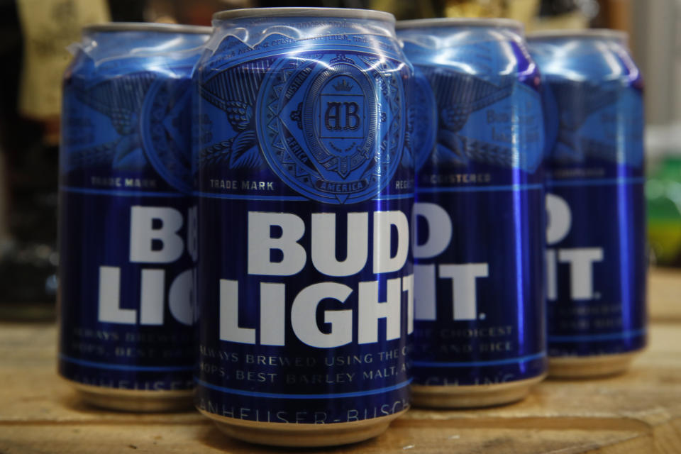 FILE - Cans of Bud Light beer are seen, Thursday Jan. 10, 2019, in Washington. On Friday, April 7, 2023, Anheuser-Busch InBev has reported a drop in U.S. revenue in the second quarter as Bud Light sales plunged amid conservative backlash over a campaign with transgender influencer Dylan Mulvaney. (AP Photo/Jacquelyn Martin, File)