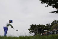 Rickie Fowler hits his tee shot on the 14th hole during the first round of the U.S. Open Championship golf tournament Thursday, June 13, 2019, in Pebble Beach, Calif. (AP Photo/David J. Phillip)