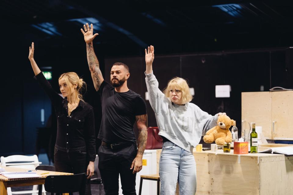 Laura Whitmore, left, with Matt Willis and Tamsin Carroll in rehearsals for 2:22 A Ghost Story (Helen Murray)