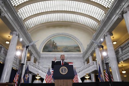 U.S. President Donald Trump speaks at the Utah State Capitol, where he announced big cuts to Utah's sprawling wilderness national monuments, in Salt Lake City, Utah, U.S., December 4, 2017. REUTERS/Kevin Lamarque