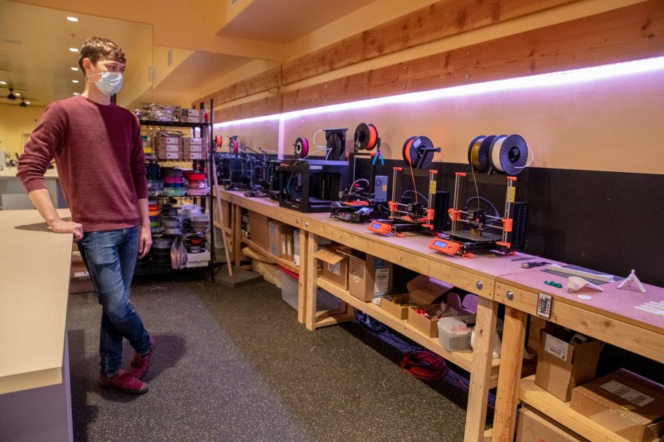 Brady Williamson watches the 3D printers inside CREATE Center for the Arts, which recently relocated to the former Venus de Fido building on Alessandro Drive in Palm Desert, Calif., on December 30, 2020.