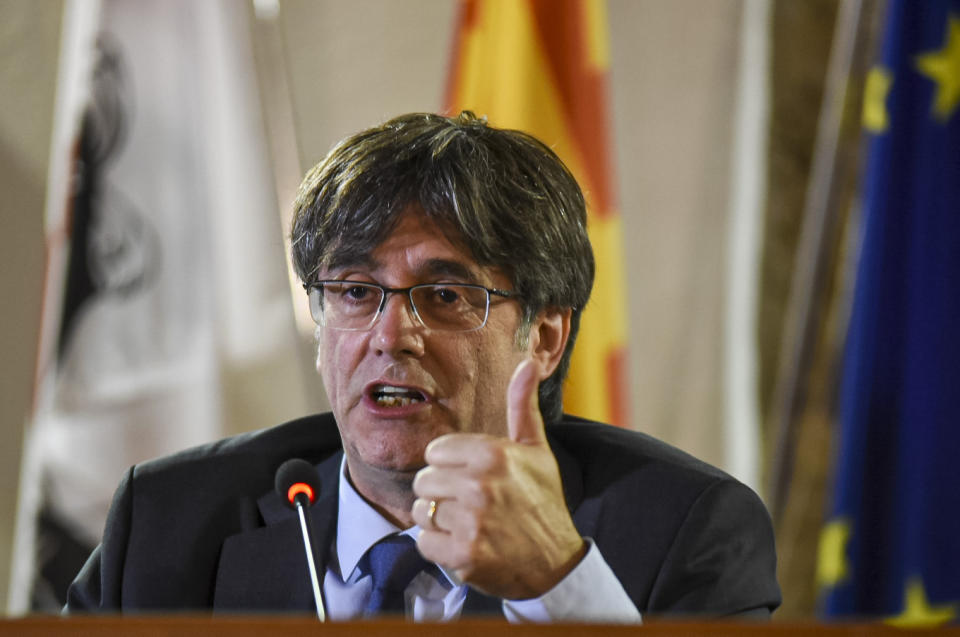 FILE - Catalan leader Carles Puigdemont speaks at a press conference in Alghero, Sardinia, on Oct. 4, 2021. Spain's Socialist Party has struck a deal with a fringe Catalan separatist party to grant an amnesty for potentially thousands of people involved in the region's failed secession bid in exchange for its key backing of acting Spanish Prime Minister Pedro Sánchez to form a new government. Socialist lawmaker and party official Santos Cerdán announced the deal on Thursday, Nov. 9, 2023, in Brussels. (AP Photo/Gloria Calvi, File)