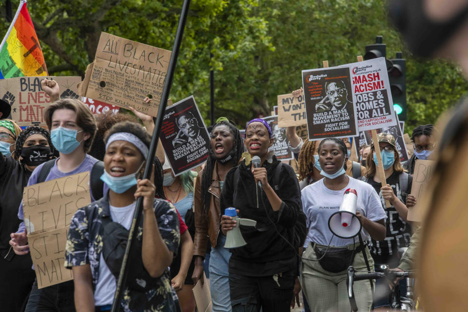 People during a protest march organised by Black Lives Matter from the US Embassy towards Parliament square, London on Saturday July 11, 2020