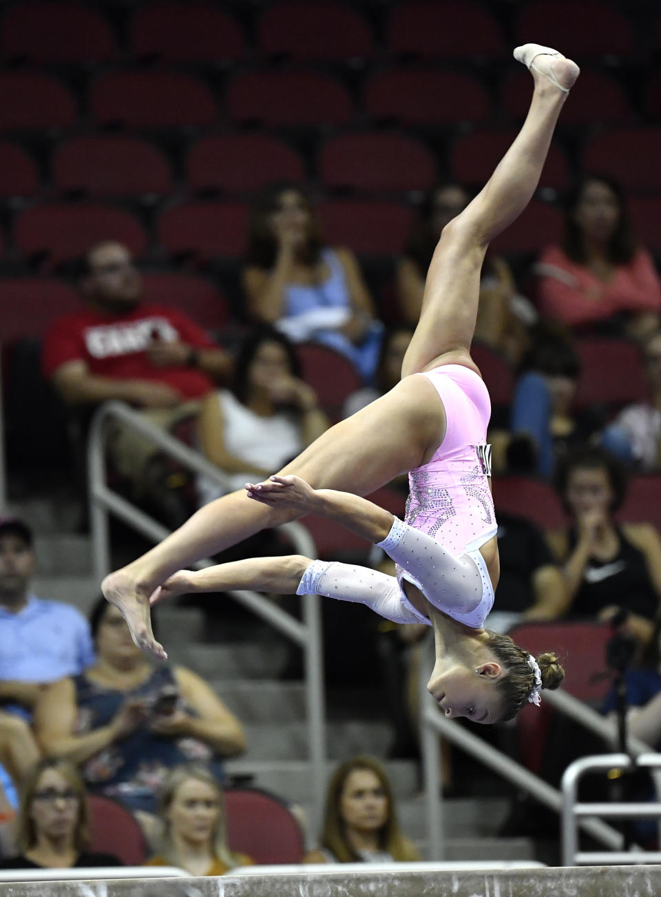 Grace McCallum performs her routine on the balance beam during the GK US Classic gymnastics meet in Louisville, Ky., Saturday, July 20, 2019. (AP Photo/Timothy D. Easley)