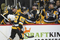 Pittsburgh Penguins' Mark Friedman (52) returns to the bench after scoring during the second period in Game 4 of an NHL hockey Stanley Cup first-round playoff series against the New York Rangers in Pittsburgh, Monday, May 9, 2022. (AP Photo/Gene J. Puskar)