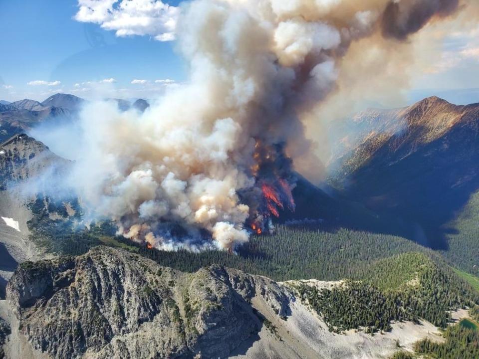 An aerial view of wildfire of Tatkin Lake in British Columbia, Canada on July 10, 2023. / Credit: BC Wildfire Service/Anadolu Agency via Getty Images