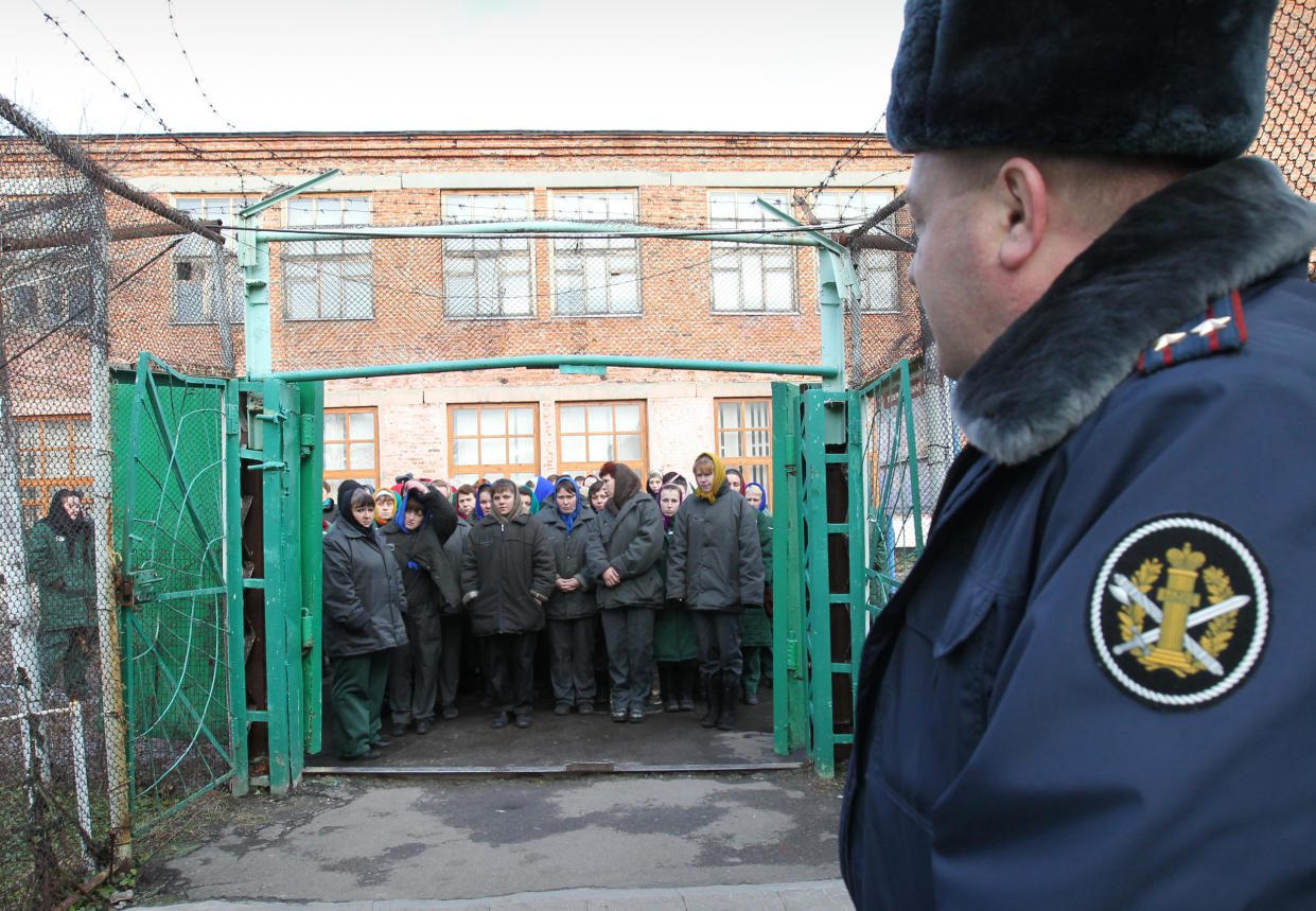 Imprisoned women wait to be escorted for work at a women's prison outside the city of Orel, central Russia, in 2011. (Yuri Tutov / AP file)