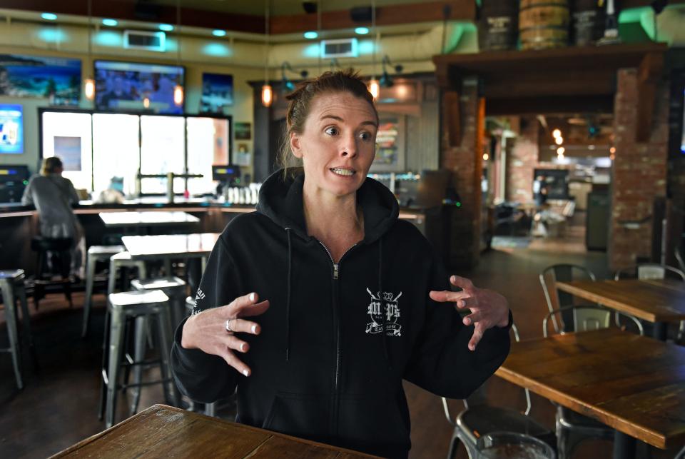 McP's Taphouse Grill employee Breeana Cody talks about how business has slowed down because of the Caldor Fire burning near the popular tourist destination of South Lake Tahoe on August 27, 2021. Concerts that would bring customers to McP's have been cancelled.
