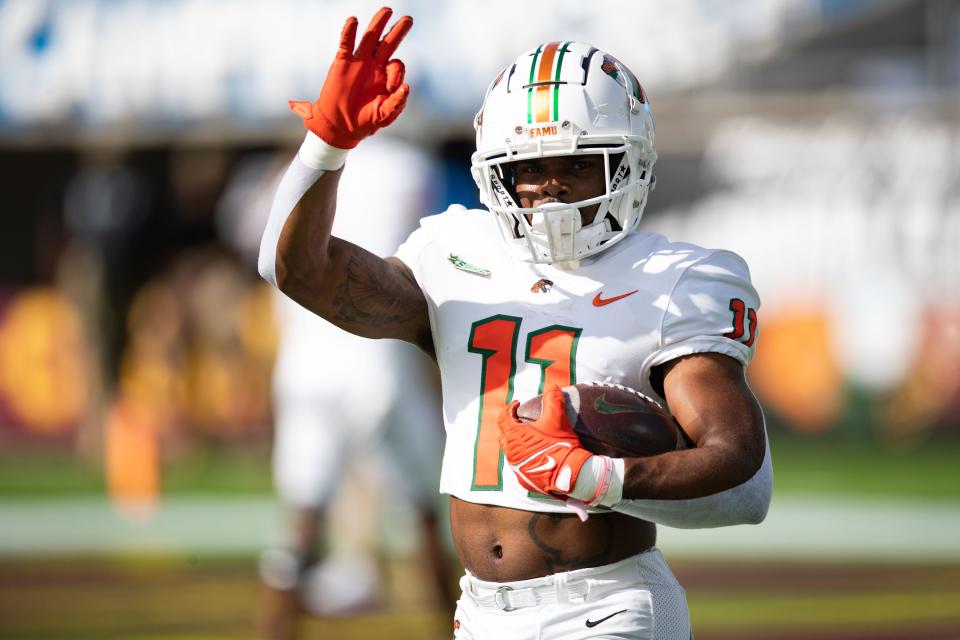 Florida A&M Rattlers defensive back BJ Bohler (11) warms up before kickoff during the Florida Classic game at Camping World Stadium on Saturday, Nov. 19, 2022.
