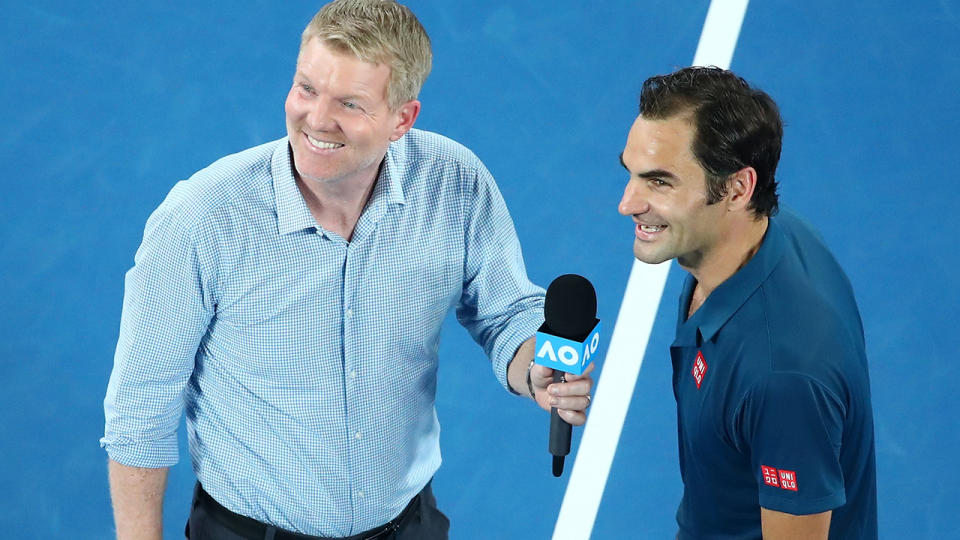 Roger Federer laughed at Lenny after the match. (Photo by Scott Barbour/Getty Images)