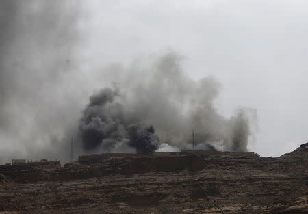 Smoke billows from the site of a Saudi-led air strike in Yemen's capital Sanaa July 2, 2015. REUTERS/Khaled Abdullah